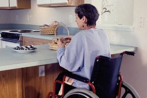 Lady with reduced mobility at home